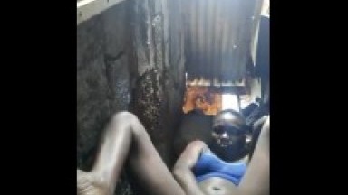 Ebony Ghana girl fingers and squirts in local shed