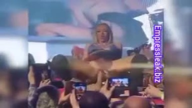 An artiste fucks a fan on stage while performing