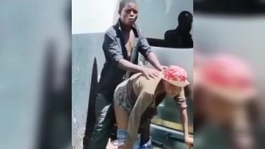 Trotro mate fucking a local prostitute behind the car